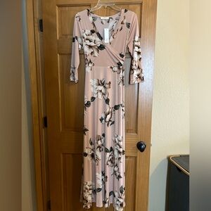 Size Large, blush colored long dress from an online boutique